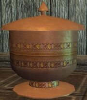 A sand blasted djinn lamp (Visible)