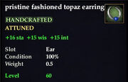 Fashioned topaz earring