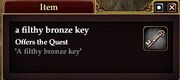 A filthy bronze key (Item)
