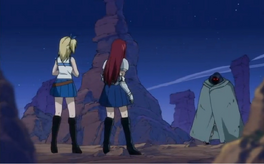 Erza y Lucy Frente al Hombre Lagarto de Daphne
