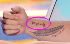 Liam-mysterious-arm-tattoo