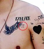 Harry 17 black 2 crosses tattoo