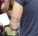 Harry handshake tattoo