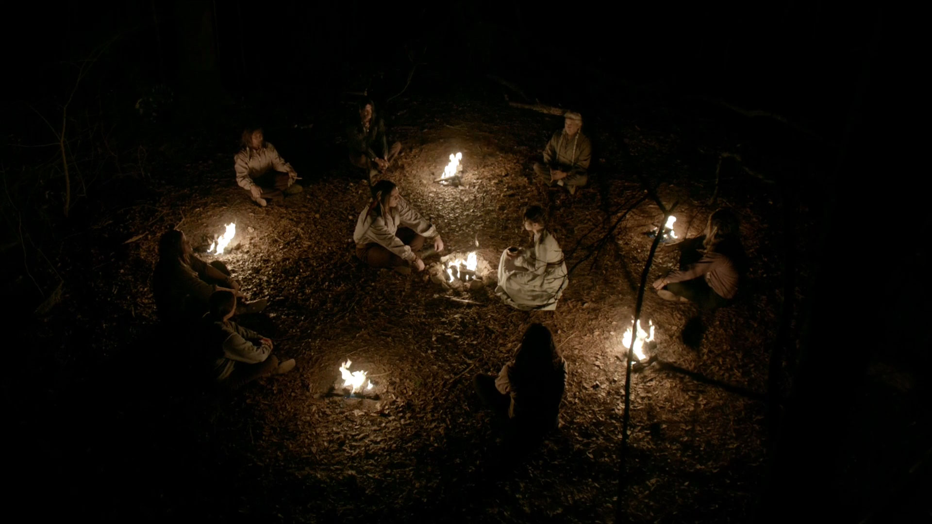 Shamans perform their ritual on Rayna.