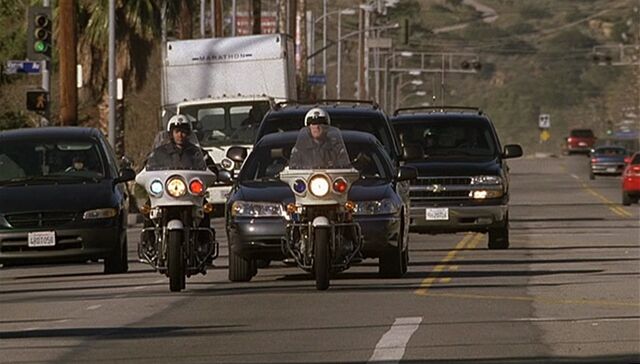 File:1x14 motorcade.jpg
