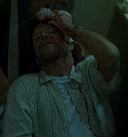 File:Bloodied man.jpg