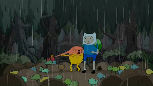 File:S4 E23 Jake being squirted by frog person.png