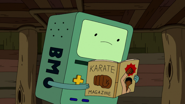 File:S6e17 BMO reading magazine.png