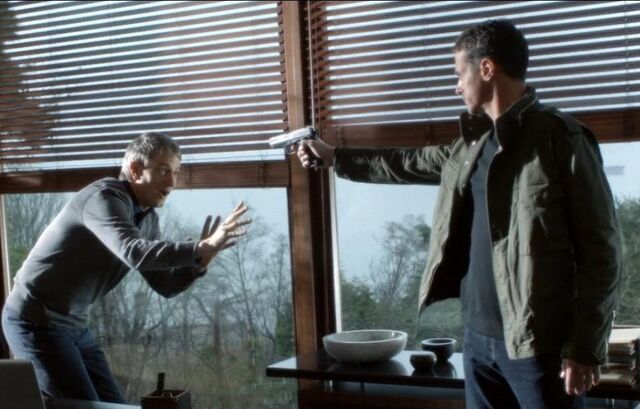 File:Sylvane holding flynn at gunpoint.jpg