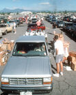 Evacuees from Mount Pinatubo collect supplies during evacuation of Clark Air Base