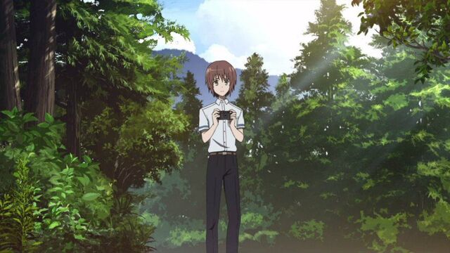 File:Mochizuki taking photo.jpg