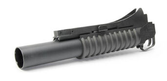 M203