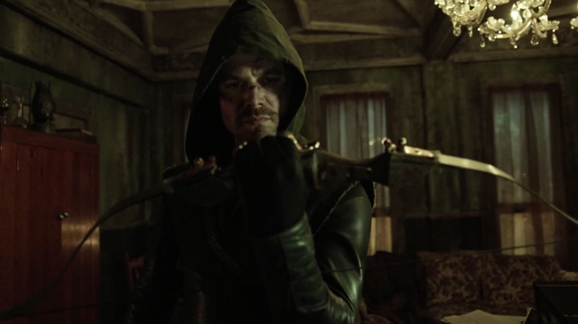 File:Oliver dons his vigilante suit for the first time.png