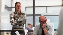 Kara and Snapper listen to Regina Williams' story