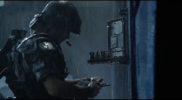 File:Hudson using tech kit.png