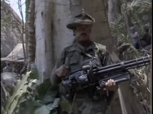 File:Ventura resting with Minigun.png