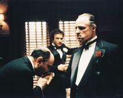 Godfather kissing the ring
