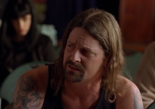 File:TattooedBiker2x12.jpg