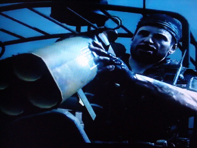 File:Woods holding Grim Reaper.jpg
