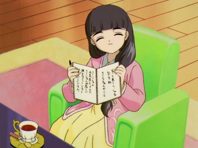 File:Tomoyo and note.png