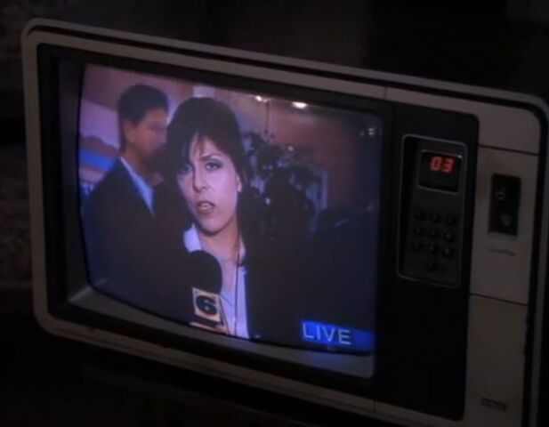 File:1x01 News Reporter.jpg