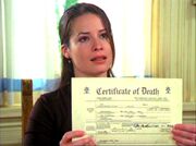 3x20-Piper-with-Leo's-death-certificate