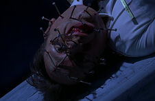 Bride-of-chucky-john-ritter-nail-death