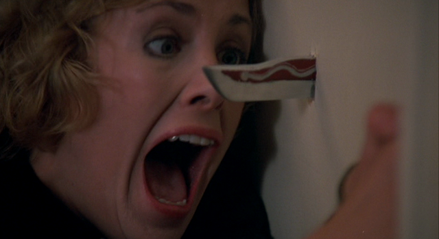 File:Childs-Play-1988-Catherine-Hicks-knife-through-door.png