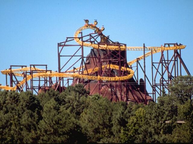 File:View of track layout with train coming out of volcano..jpg
