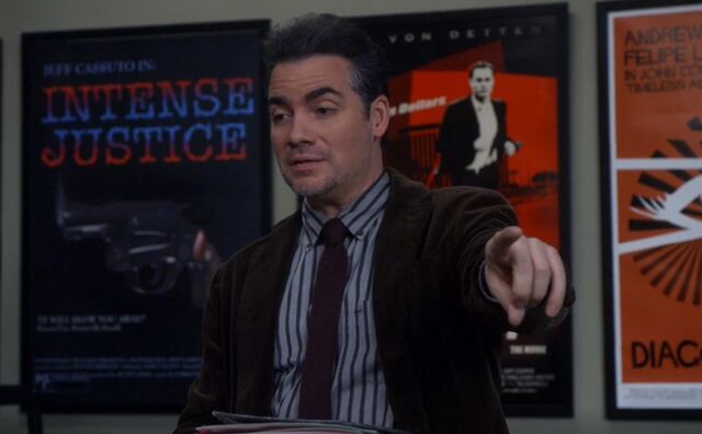 File:S05E02-Garrity points at Abed.jpg