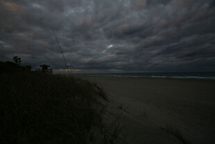 Dark-looming-clouds-over-juno-beach-floirda-hdr-pier-beach-lifeguard-tower-4