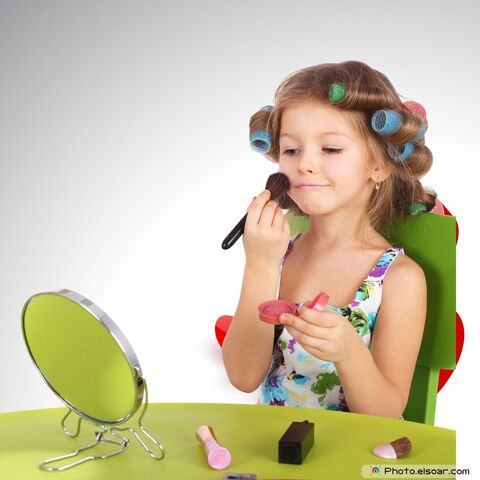 File:Glamour-Girl-With-Cosmetics-In-front-of-the-mirror-1-.jpg