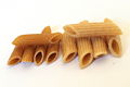 120px-Whole wheat penne, cooked and uncooked