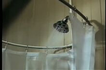Stock-footage-shower-head-turning-on