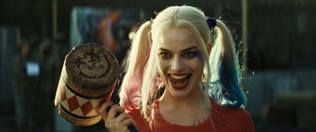 File:Harley Quinn holds a mallet.jpg