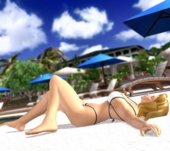 File:DOAX2 Tina Sunbath.jpg