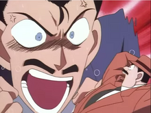 Kogoro le grita a Megure.png