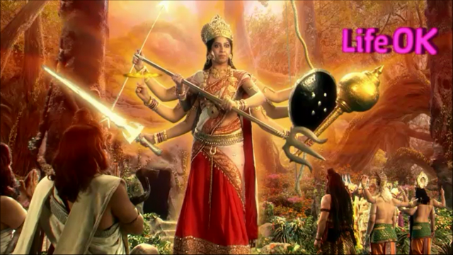 File:Eight-Armed Goddess Adishakti Grows To Massive Size in Front of Tridev.png
