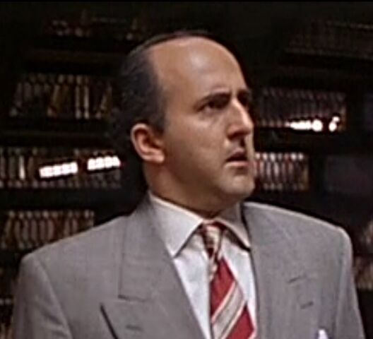 File:Businessman at Station.jpg