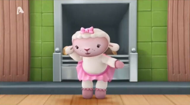 File:Lambie by the fireplace.jpg
