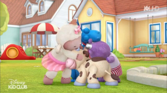 File:Lambie, stuffy, hallie and moo moo hugging.jpg