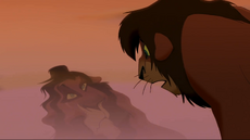 Kovu sees Scar's Face in water