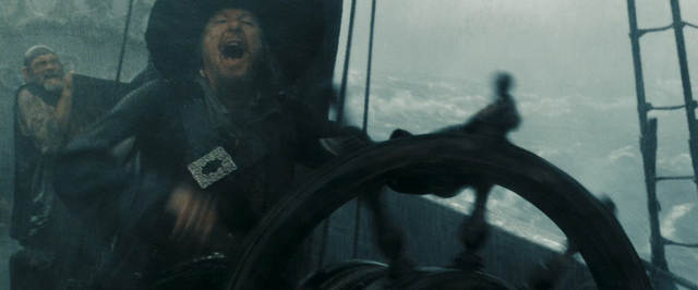 File:Barbossa at the wheel.png