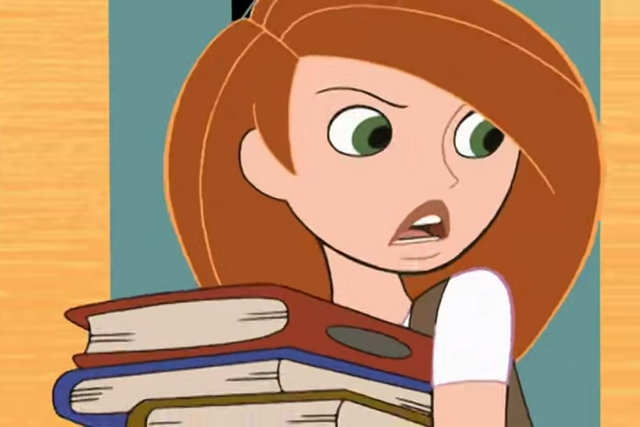 File:Kim with books.png