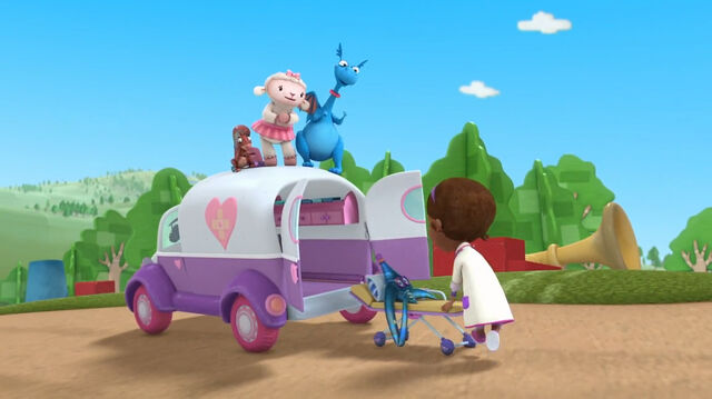 File:Doc brings oooey into the ambulance.jpg