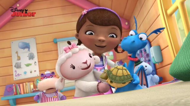 File:Lambie and stuffy holding theo.jpg