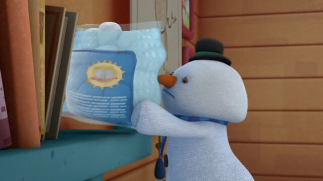 File:Chilly picks up a bag of cottons balls.jpg