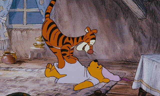 File:Tigger has bounced on Pooh Bear.jpg