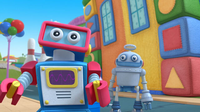 File:Two toy robots.jpg
