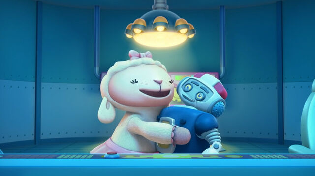 File:Lambie hugs robot ray.jpg